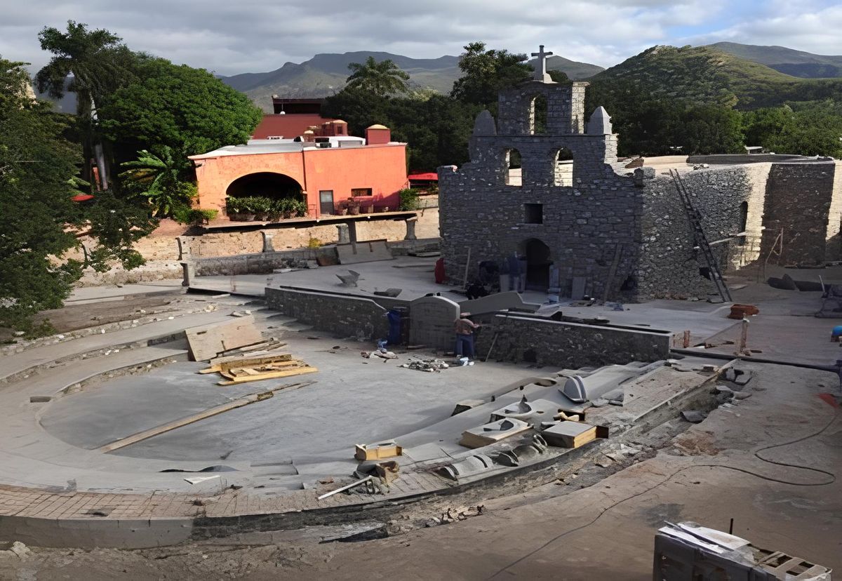 The chapel under construction with Sierra Madre mountains